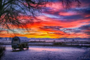Sunset clouds reflected over water at Ninepipe National Wildlife Refuge, Montana